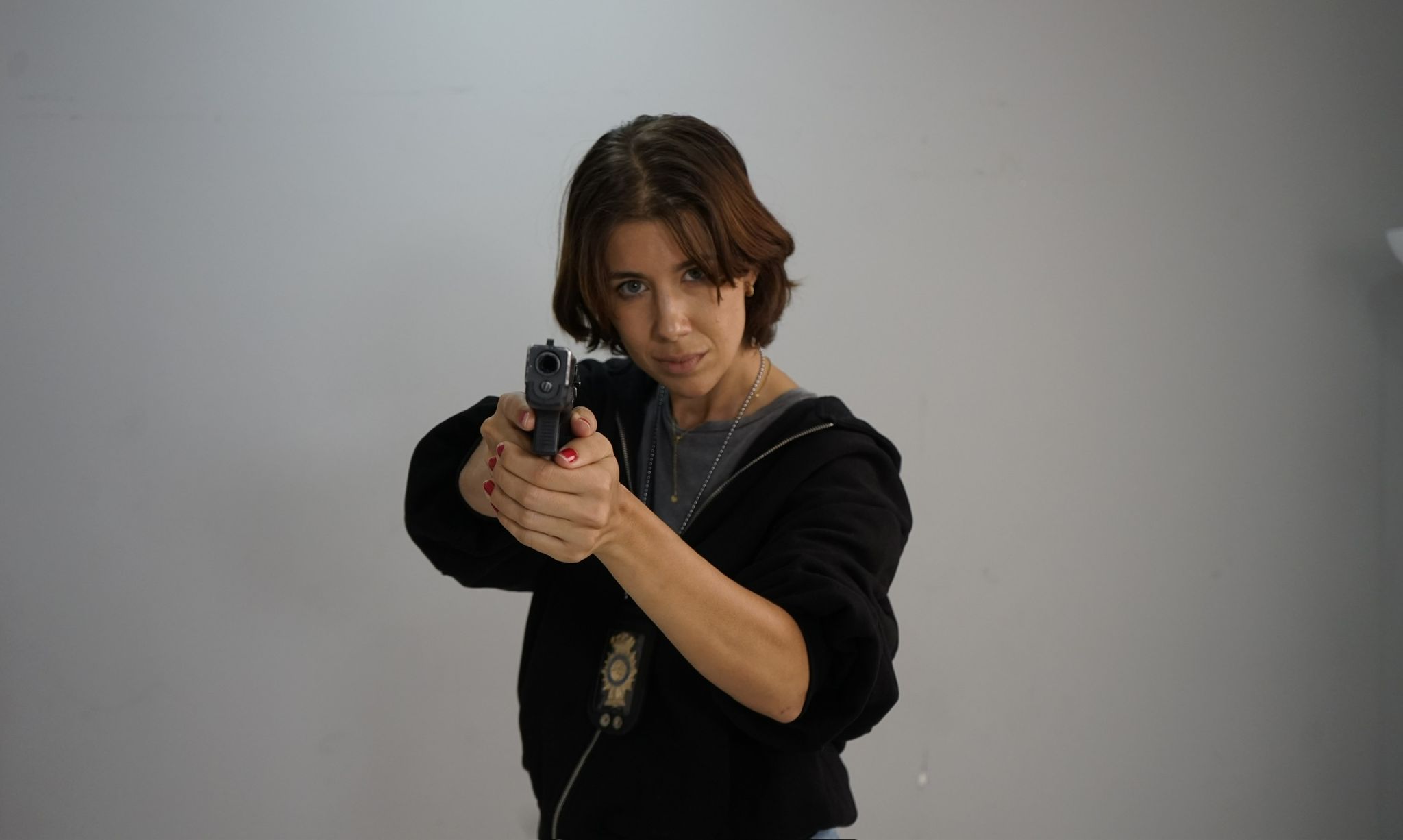 René Martín, escena de acción con arma
